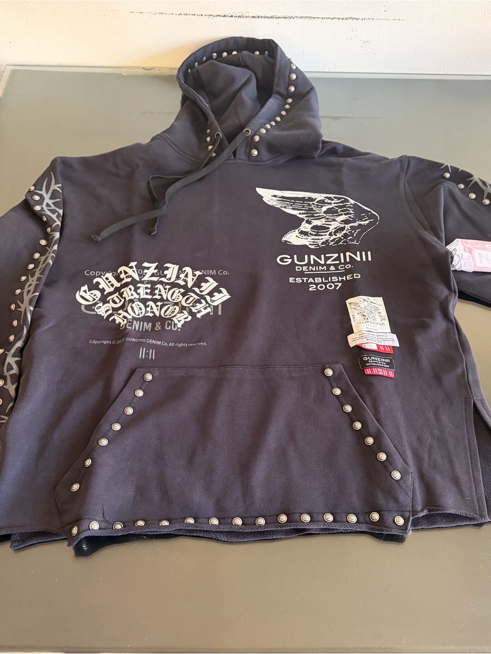 GUNZINI Denim & Co. Studded Black Hoodie with Wing Graphic size sm